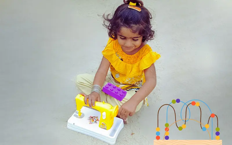 a girl playing with swing machine toys